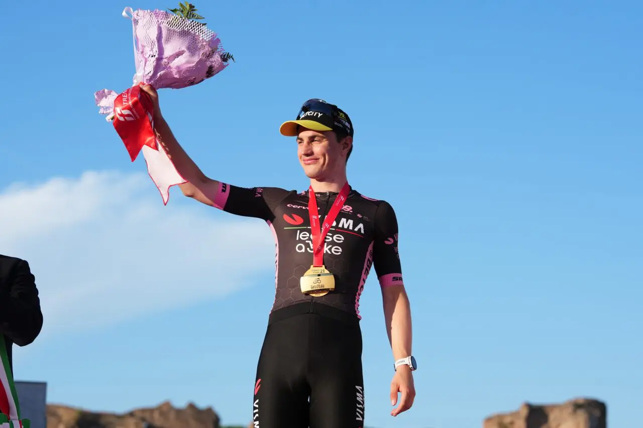 A TvL rider poses on the podium at the end of the Giro d'Italia. TvL will be hoping to create scenes like these at the Giro d'Italia 2026