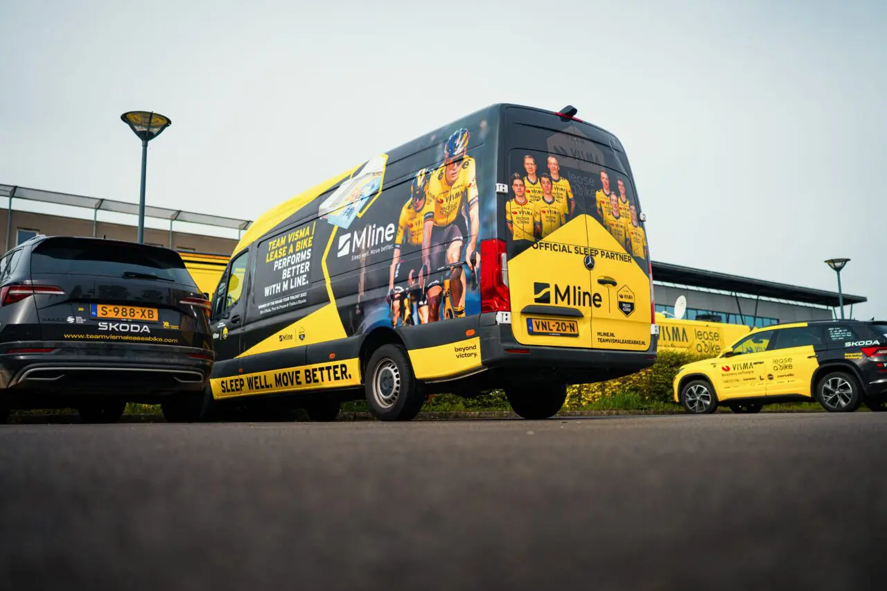 TvL vehicles parked up during the Tour de France 2026